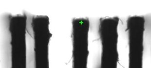 Figure 5a (bottom): The middle actuator is leaning towards the right.